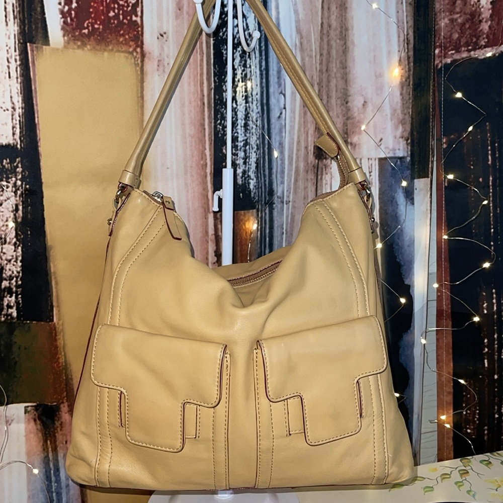 EUC KATE SPADE SLOUCH BAG.Soft camel color leather and goldtone hardware.